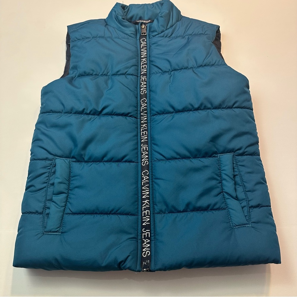 Calvin Klein Blue Puffer Jacket with High Collar and Quilted Design